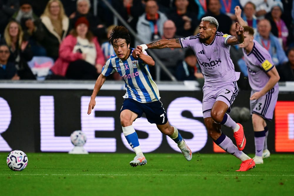 Newcastle United midfielder Joelinton (7) gets to grips with Coventry City midfielder Tatsuhiro Sakamoto (7)  during the Premier League match between Coventry City and Newcastle United at the Coventry Building Society Arena, Coventry, UK on 12 October 2026.