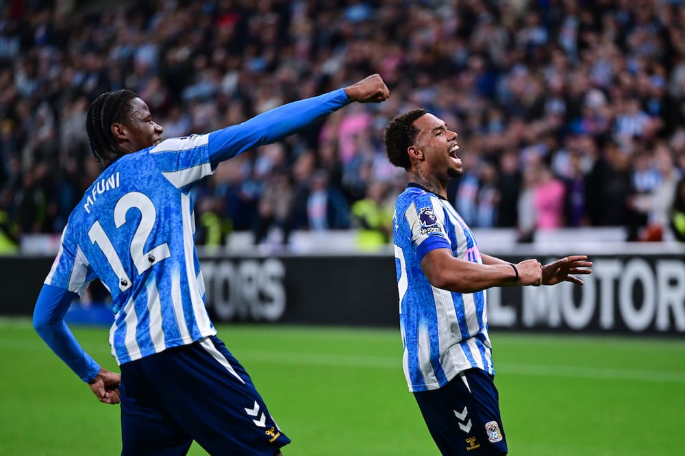 Coventry City midfielder Stephen Mfuni (12) and Coventry City defender Milan Van Ewijk (27) celebrate victory during the Premier League match between Coventry City and Newcastle United at the Coventry Building Society Arena, Coventry, UK on 12 October 2026.
