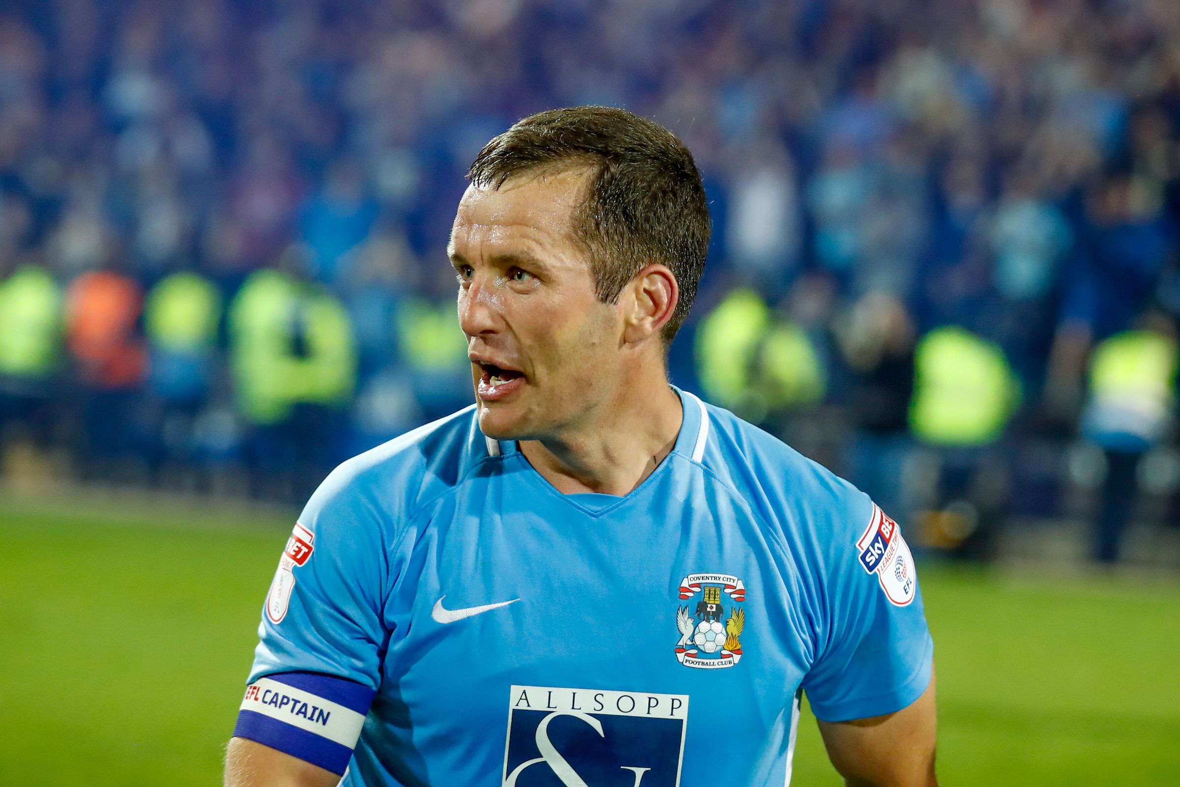 Coventry City captain & midfielder Michael Doyle (8) celebrates victory during the EFL Sky Bet League 2 match between Notts County and Coventry City at Meadow Lane, Nottingham, England on 18 May 2018. Picture by Simon Davies.